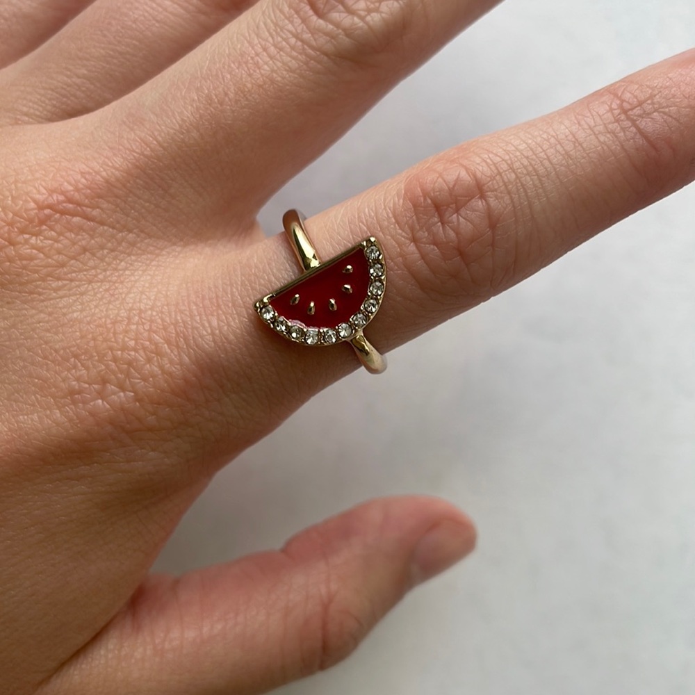 Gold rings, watermelon and plain gold. Width: 2mm